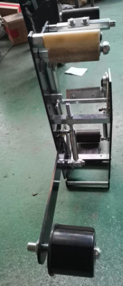 封箱机贴带器机芯-贴带器原理