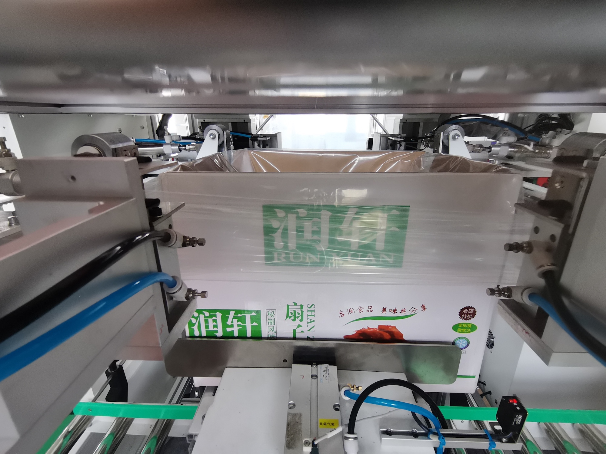 火锅料套袋机-自动折袋机-套袋机中能轴承更换